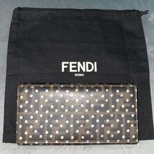 Fendi long wallet pristine condition color is brown with polkadots .